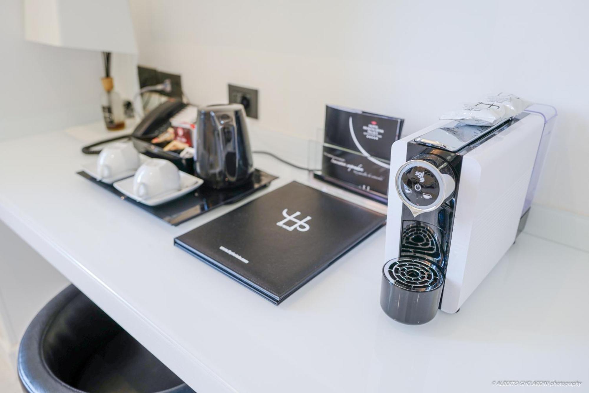 LHP Hotel Montecatini Palace&SPA Esterno foto A Nespresso coffee machine in a hotel room